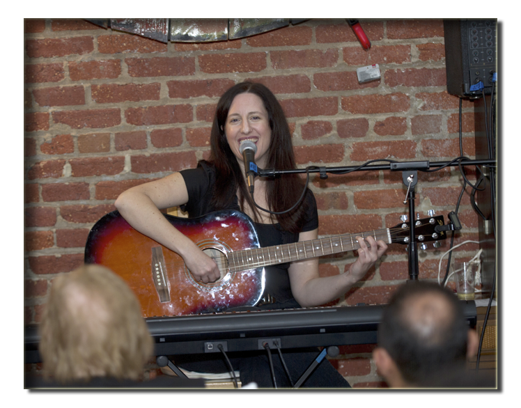 Elaine with guitar and keys